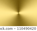Background of brushed metal gold plate with reflections in circular shape 110490420