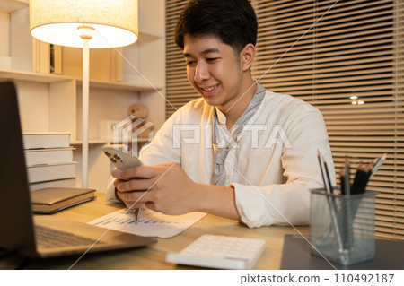 Man typing chat or message on mobile phone, Typing Chat Message on Smartphone, Digital Communication, Conversation via smartphone of internet network. 110492187