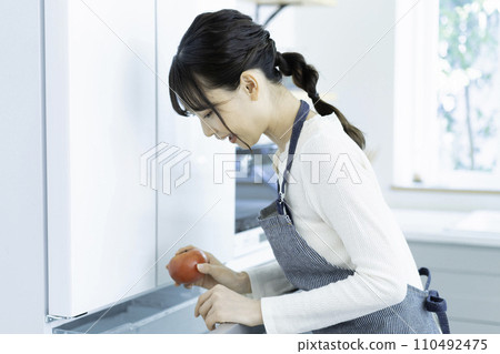 A young lady who had an apron A young lady who had an apron 110492475