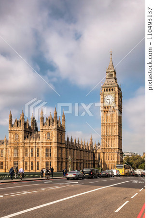 Big Ben during a sunny day with busy bridge in London, England, UK 110493137
