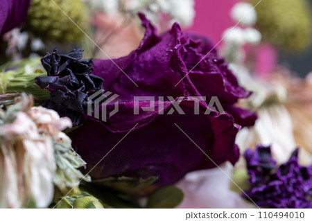 A combined bouquet of different types of flowers in close-up 110494010