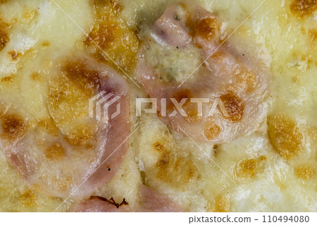 pizza using a large number of different ingredients close-up pizza using a large number of different ingredients close-up 110494080