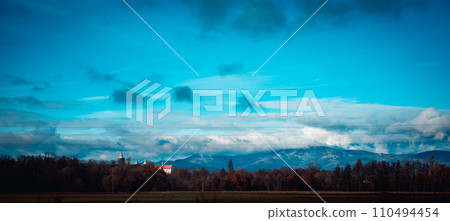 Autumn view of the Pyrenean mountains in Poland concept photo. Beautiful Polish countryside church. 110494454