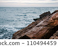 Winter sea with stones on the beach concept photo. Underwater rock. Mediterranean sea. 110494459