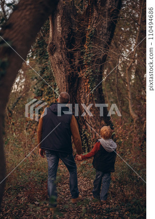 Man and boy tourists autumn time leisure, vacation hiking or traveling touristic activity. 110494686