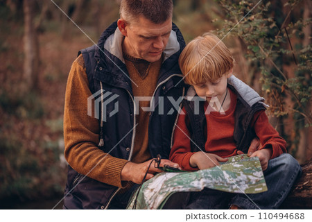 Man and boy tourists autumn time leisure, vacation hiking or traveling touristic activity. 110494688