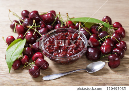 Bowl of cherry jam with fresh fruits Bowl of cherry jam with fresh fruits 110495085