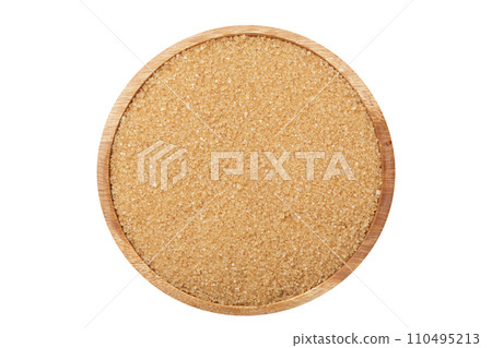 Bowl of brown sugar isolated on white background Bowl of brown sugar isolated on white background 110495213