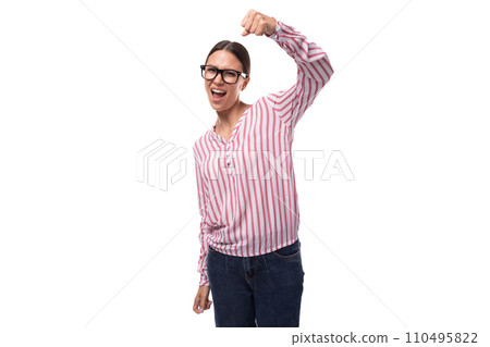 young cheerful slim business lady with a ponytail hairstyle wears glasses and a striped shirt on a young cheerful slim business lady with a ponytail hairstyle wears glasses and a striped shirt on a 110495822
