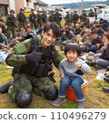 Self-Defense Force personnel assisting children in life-saving efforts 110496279