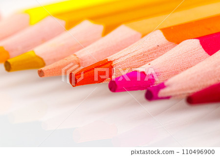 macro multicolored pencils on a white background 110496900