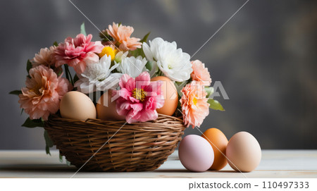 Charming composition of wicker basket, pastel-colored eggs and vibrant mix of spring flowers, pink dahlias, white chrysanthemums, against grey background, Easter spring basket with floral decoration Charming composition of wicker basket, pastel-colored eggs and vibrant mix of spring flowers, pink dahlias, white chrysanthemums, against grey background, Easter spring basket with floral decoration 110497333