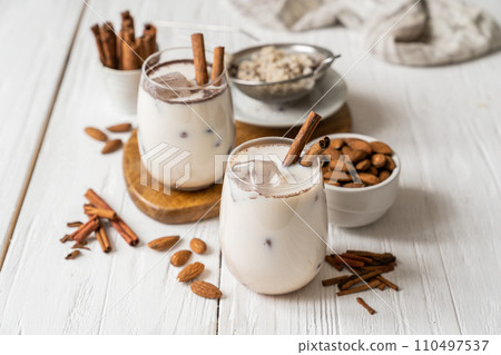 Horchata drink - traditional mexican rice based drink with cinnamon and almonds Horchata drink - traditional mexican rice based drink with cinnamon and almonds 110497537