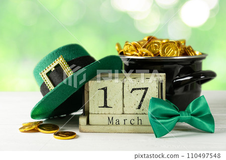 St Partick's day concept - pot of gold, calendar, hat 110497548