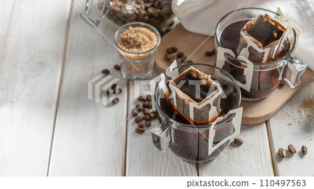 Drip coffee concept on white woob background 110497563