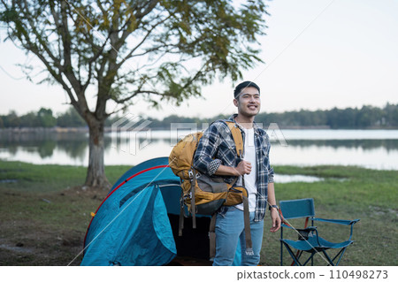 Man asian traveling with tent camping on mountain top outdoors adventure lifestyle hiking active summer vacations Man asian traveling with tent camping on mountain top outdoors adventure lifestyle hiking active summer vacations 110498273