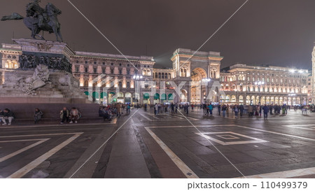 Panorama showing Milan Cathedral and Vittorio Emanuele gallery night timelapse. Panorama showing Milan Cathedral and Vittorio Emanuele gallery night timelapse. 110499379