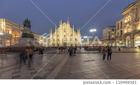 Panorama showing Milan Cathedral and Vittorio Emanuele gallery day to night timelapse. 110499381