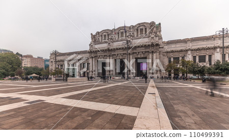 Panorama showing Milano Centrale timelapse - the main central railway station of the city of Milan in Italy. 110499391