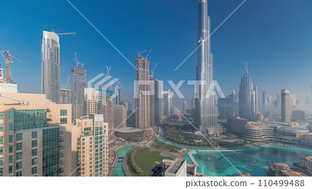 Aerial view of Dubai city early morning during fog timelapse. 110499488