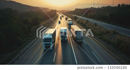 semi trucks going down a highway semi trucks going down a highway 110500280