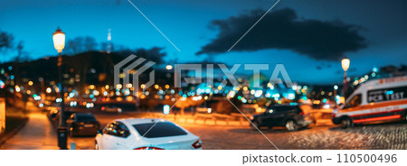 Panoramic Streetview Night Boke Bokeh Blurred Background. Blurred Boke Bokeh Background Of City Night Illumination. Abstract Blurred Bokeh Architectural Urban Backdrop Panoramic Streetview Night Boke Bokeh Blurred Background. Blurred Boke Bokeh Background Of City Night Illumination. Abstract Blurred Bokeh Architectural Urban Backdrop 110500496