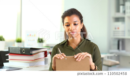 Beautiful smiling businesswoman portrait workplace 110502458