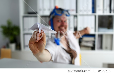 Man wearing suit and tie in goggles and snorkel Man wearing suit and tie in goggles and snorkel 110502500