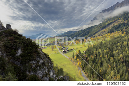 impressive sunset at Alps. Wonderful Picturesque landscape with colorful dramatic sky over the mountain valley. impressive sunset at Alps. Wonderful Picturesque landscape with colorful dramatic sky over the mountain valley. 110503362