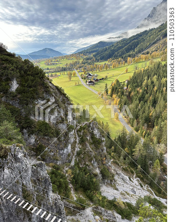 impressive sunset at Alps. Wonderful Picturesque landscape with colorful dramatic sky over the mountain valley. 110503363
