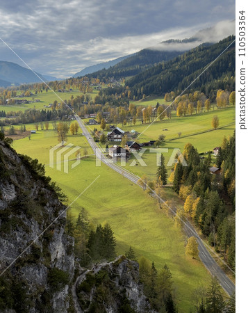 impressive sunset at Alps. Wonderful Picturesque landscape with colorful dramatic sky over the mountain valley. 110503364