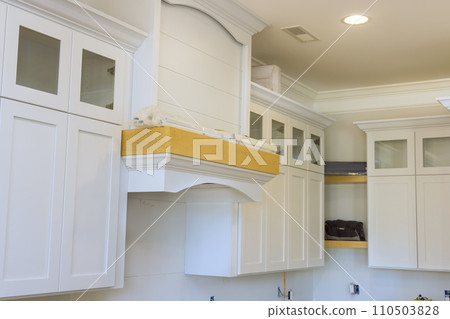 Building under construction new home with custom modular kitchen cabinets Building under construction new home with custom modular kitchen cabinets 110503828