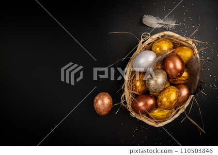 Golden and silver Easter eggs 110503846