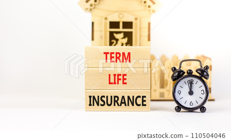 Term life insurance symbol. Concept words Term life insurance on beautiful wooden blocks. Beautiful white table white background. Black alarm clock. Medical term life insurance concept. Copy space. Term life insurance symbol. Concept words Term life insurance on beautiful wooden blocks. Beautiful white table white background. Black alarm clock. Medical term life insurance concept. Copy space. 110504046