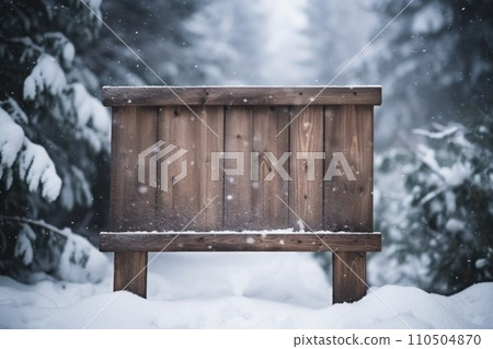 Wooden sign board snow covered with copy space for text Wooden sign board snow covered with copy space for text 110504870