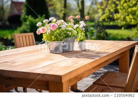 A table with a couple of buckets of flowers on it 110504962