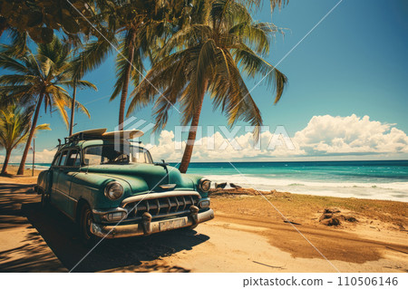 An old car parked on a tropical beach with a canoe on the roof. An old car parked on a tropical beach with a canoe on the roof. 110506146
