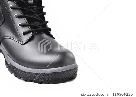 Winter male black leather boot on a white background, hiking shoes, practical off-road shoes, close-up details of the model 110506230