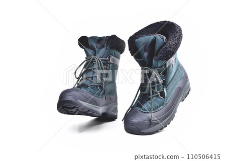 insulated off-road boots for the cold season, high shin, lacing, anti-slip corrugated reinforced sole for travel and winter fishing isolate on a white background insulated off-road boots for the cold season, high shin, lacing, anti-slip corrugated reinforced sole for travel and winter fishing isolate on a white background 110506415
