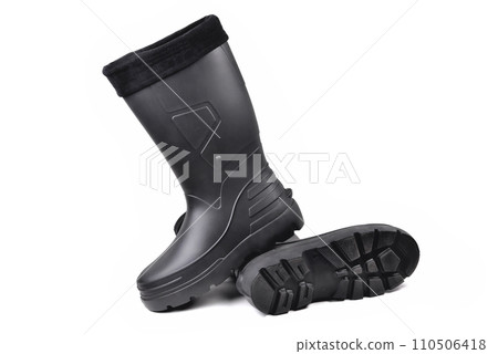 black high insulated specialized boots for hunting off-road fishing and traveling in the cold season on a white background isolate 110506418