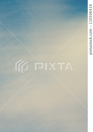 Abstract clouds in the blue sky, retro style image with vintage effect. The background is vertical. Backdrop. Design element for brochures, advertising, presentations, websites and other graphic Abstract clouds in the blue sky, retro style image with vintage effect. The background is vertical. Backdrop. Design element for brochures, advertising, presentations, websites and other graphic 110506419