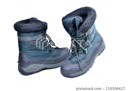 specialized shoes, off-road boots warmed for the cold season, high shin, lacing, anti-slip corrugated reinforced sole for travel and winter fishing isolate on a white background 110506427