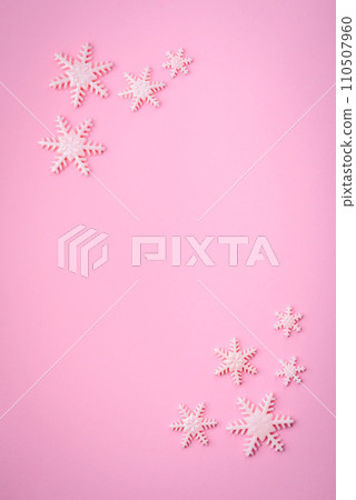Beautiful winter snowflakes on a plain background with copy space 110507960
