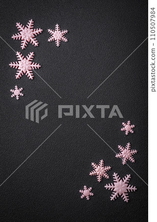 Beautiful winter snowflakes on a plain background with copy space 110507984