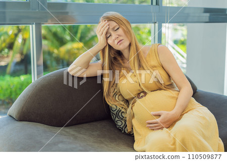 Expectant woman experiences discomfort, feeling unwell during pregnancy 110509877
