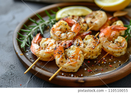 Grilled shrimps or prawns served with lemon and garlic. Seafood. Generative AI Grilled shrimps or prawns served with lemon and garlic. Seafood. Generative AI 110510055