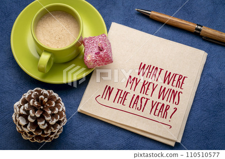 What were my key wins in the last year? Self reflection question on a napkin. Review of successes in the past year. 110510577