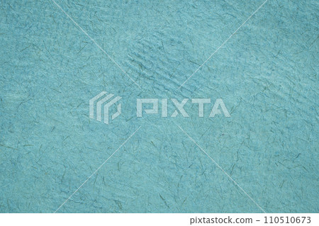 background of blue Huun Mayan handmade paper created in Mexico background of blue Huun Mayan handmade paper created in Mexico 110510673