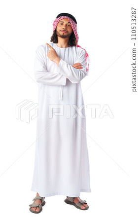 Arab saudi young man pointing to side isolated on a white background Arab saudi young man pointing to side isolated on a white background 110513287