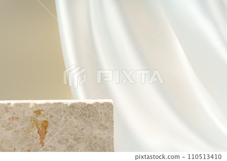 Stone podium decorated with white silk fabric for display 110513410
